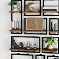 Stylish Decorative Ornament Set with Black Frame Shelves Various Shaped Vases Sculptures and Geometric Panels