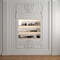 Ornate White Carved Decorative Cabinet In Interior Wall With Displayed Items