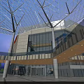 Modern Commercial Complex Featuring Large Digital Screen Blue White Square Facade And Vibrant Pedestrian Area