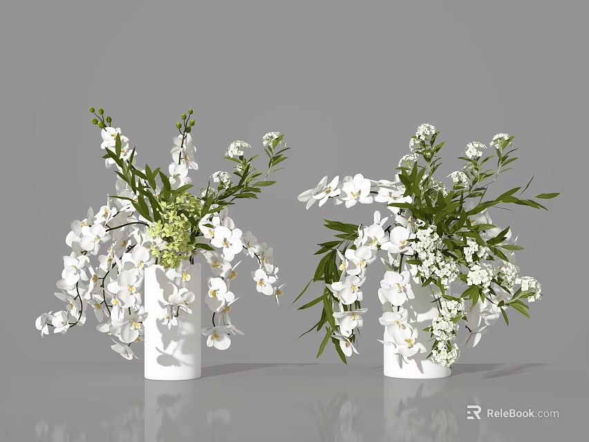 White Orchid Arrangement With Green Leaves and Small Blooms in White Vases for Home Decor 3d model 