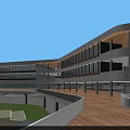 Modern School Building with Green Roofs Track and Field Sports Courts and Surrounding Trees