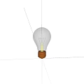 Bright Glowing Clear Glass Light Bulb With Filament On Dark Background
