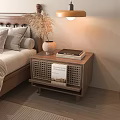Cozy Bedroom Wooden Bedside Table with Woven Design Vase Dried Flowers and Books