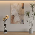 Abstract Painting With Leaf Patterns And Beige Brown Tones Near Astronaut Figurine And Potted Plant