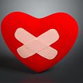 Red Heart Shaped Knitted Pillow With Cross Shaped Band Aid Design