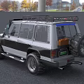 Silver And Black Off Road Car With Roof Rack Large Bumper And Off Road Tires