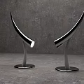 Golden Modern Curved Table Lamps With Round Base Illuminated In Room
