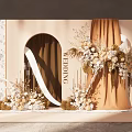 Elegant Wedding Decor With Archway Beige Curtain Floral Arrangements And Ribbon