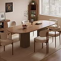 Modern Dining Room With Oval Wooden Table Six Chairs Bookshelf And Natural Light