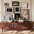 Wooden TV Stand With Drawers Glass Doors Decorative Vase Statue Candlesticks And Framed Wall Art