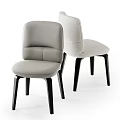 Modern Upholstered Single Chair With Gray Light Colored Seat And Black Legs