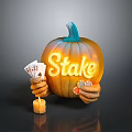 Halloween Pumpkin Decoration With Hands Holding Playing Cards Lit Stake Text And Candle