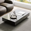 Black Modern Glossy Coffee Table with Tray Two Glasses and Open Book in Living Room