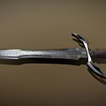 Ancient Handcrafted Sword With Intricate Engraved Blade And Decorated Hilt