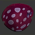Purple Butterfly Perched on Pink Mushroom with White Spots and Purple Base