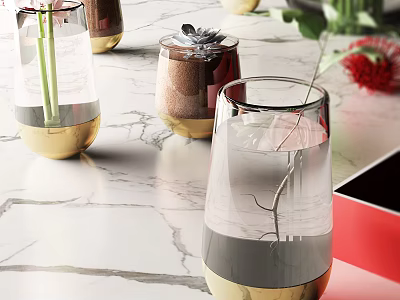 Transparent Glass Vases with Gold Base Holding Fresh Flowers on Marble Countertop 3d model