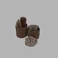 Soft Brown Throw Pillows In Woven Baskets With Cozy Blanket For Home Decor
