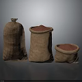 Three Burlap Sacks With Red Grains Food In Different Sizes On Dark Surface