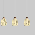 Three Hanging Pendant Lights With Pleated Lampshades And Wooden Bases For Interior Decoration