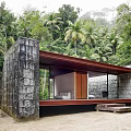 Contemporary Detached Villa With Stone Walls Large Glass Windows And Wooden Steps In Lush Forest