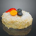 Delicious Coconut Flake Covered Cake Topped With Strawberry Orange Slice And Blueberries
