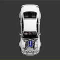 A White Modified Sports Car with Hood Open Revealing Blue Engine and Aerodynamic Body Kit