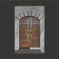Elegant Wooden Entrance Door With Ornate Stone Frame And Intricate Carvings