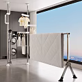 Modern Clothes Drying Rack with White Quilted Blanket and Hanging Clothes in Room with Large Window City View
