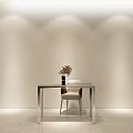 Minimalist Office Desk With Glass Top Metal Frame Vase And Dried Flowers In Soft Lighting