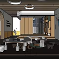 Bright Kindergarten Indoor Area With Round Tables Arched Doorways And Decorative Paintings