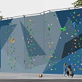 Outdoor Blue Climbing Wall Featuring Colorful Holds And Kids Playing Nearby