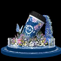 Floral Display With Orage Cafe Coffee Cup Butterfly Railing And Colorful Flowers On Blue Base