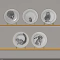 Wooden Shelves Displaying White Plates With Hedgehog Owl Squirrel Rabbit Bird Illustrations