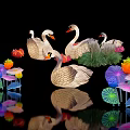 Landscape Sculpture With Illuminated Swans Colorful Flowers Leaves And Reflections
