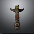 Traditional Totem Pole With Eagle Head And Carved Faces In Modern Display Setting