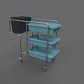 Hospital Ward Medical Cart With Blue Trays And Black Trash Bin On Wheels
