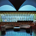 Bar Interior Featuring Wine Bottle Display Green Cartoon Doll Round Table Black Chairs Red Lighting
