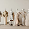 Mannequins In Stylish Beige White And Brown Outfits With Hats Boots And Long Dresses