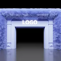 Event Entrance with Purple Fluffy Material and White Decorative Pillars Featuring Central Logo Sign