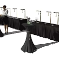 Long Dining Tables With Black Tablecloths Plates Glassware And Service Staff