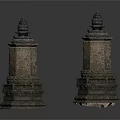 Two Ancient Stone Sculptures With Intricate Tower Shaped Design And Detailed Patterns