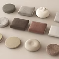 Soft Fabric Cushions with Various Shapes Including Round and Square in Neutral Tones