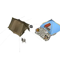 Two Brown and Blue Camping Tents with Plaid Blanket Folding Chair and Basket