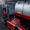 Red And Gray Heavy Truck With Tank Trailer At Industrial Site