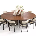 Elegant Modern Private Dining Room With Round Wooden Table Chairs And Flower Arrangement