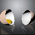 Cracked Egg Halves With Yolk in One and Empty in the Other