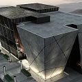 Modern Architectural Building Design With Geometric Stone Facade And Glass Windows