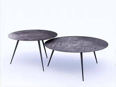 Two Round Coffee Tables With Cracked Texture Dark Surface And Black Slender Legs 3d model