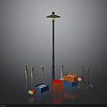 Black Street Lamp Pole With Wooden Posts Blue Orange Boxes Red Stool Trolley And Balls