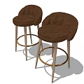 Brown Upholstered Bar Stools With Wooden Legs And Gold Ring Footrest